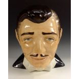 A ceramic bust of Clark Gable,