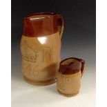 A large Doulton Lambeth salt glazed stoneware two quart jack, in brown and buff,