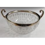 A late Victorian large crystal cut glass bowl, stylised flower design registered by John Grinsell,