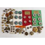 Buttons - a set of four Floyd and Gregory enamel buttons,