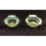 A pair of Victorian Stourbridge open glass salts, triform undulating rim, clear glass frill,