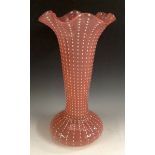 A late 19th century Stourbridge tall glass vase, pink glass decorated with applied white glass dots,