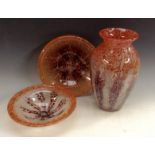 A WMF Ikora crystal glass ovoid vase, decorated with red, puce and clear crackle effect specks,