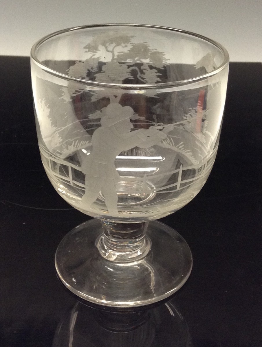 A 19th century glass rummer, wheel engraved with a hunting scene, spreading circular foot,