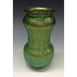 A Loetz iridescent green glass shaped ovoid vase, moulded sides, polished pontil to base, 17.