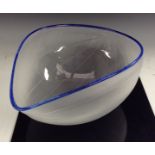 A Chris William Art Glass Shell bowl, frosted glass with line cut detail, applied blue rim,