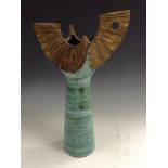 A Clive Brooker studio pottery vase, in tones of turquoise blue and green,