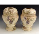 A pair of Doulton Burslem Mona pattern pedestal lobed ovoid vases,