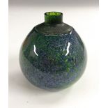 A Norwegian ovoid glass vase, in tones of green and blue with bubble inclusions,