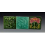 Tiles - an early 20th  century Art Nouveau dust pressed tile,  tube lined with foliate roundel,