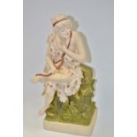 A Royal Dux figure, of a classical hunter, seated with bow and quiver on his back,