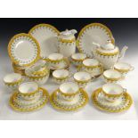 A Royal Doulton Keble pattern tea service, for eleven, the border with stylised flowers,