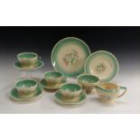 A Susie Cooper Dresden Spray part tea service, comprising four cups and saucers, sugar bowl,