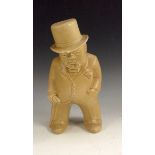 A Bovey Pottery figure,  Winston Churchill from the Our Gang series, buff glaze,  20cm high,