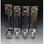 A set of four Archibald Knox style chrome finger plates and door handles,