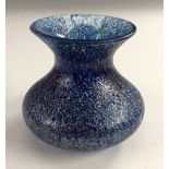 An art glass compressed spiral vase, clear glass cased with blue mesh detail and inclusions,