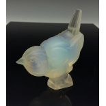 A Sabino Art Deco opalescent moulded glass bird, signed to base Sabino Paris, 9cm high, c.