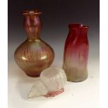 An iridescent globular glass vase, in the style of Loetz,