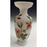 An Art Nouveau Baccarat opaline glass baluster vase, painted with wild roses, 23cm high, c.