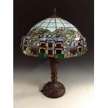A modern stained glass table lamp, in the Art Nouveau style,