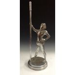 A large novelty chrome figure, as a Renaissance gentleman courtier holding a pole, 54cm high, c.