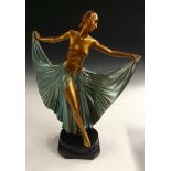 An Art Deco plaster figure, of a dancing woman,
