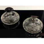 A matched pair of Art Deco compressed ovoid cut glass scent bottles, one with atomiser,