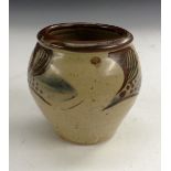 A Janet Leach (British, b.1918) ovoid pottery vase, painted with striking art designs, 12cm high, c.