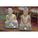 A carved Thai wooden deity; another,