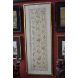 A Chinese silk panel, embroidered with butterflies in flight,