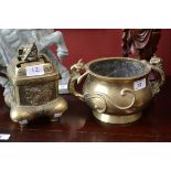 A Chinese brass censer, pierced cover with temple dog handle,