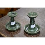 An almost matched pair of ceramic oil lamps