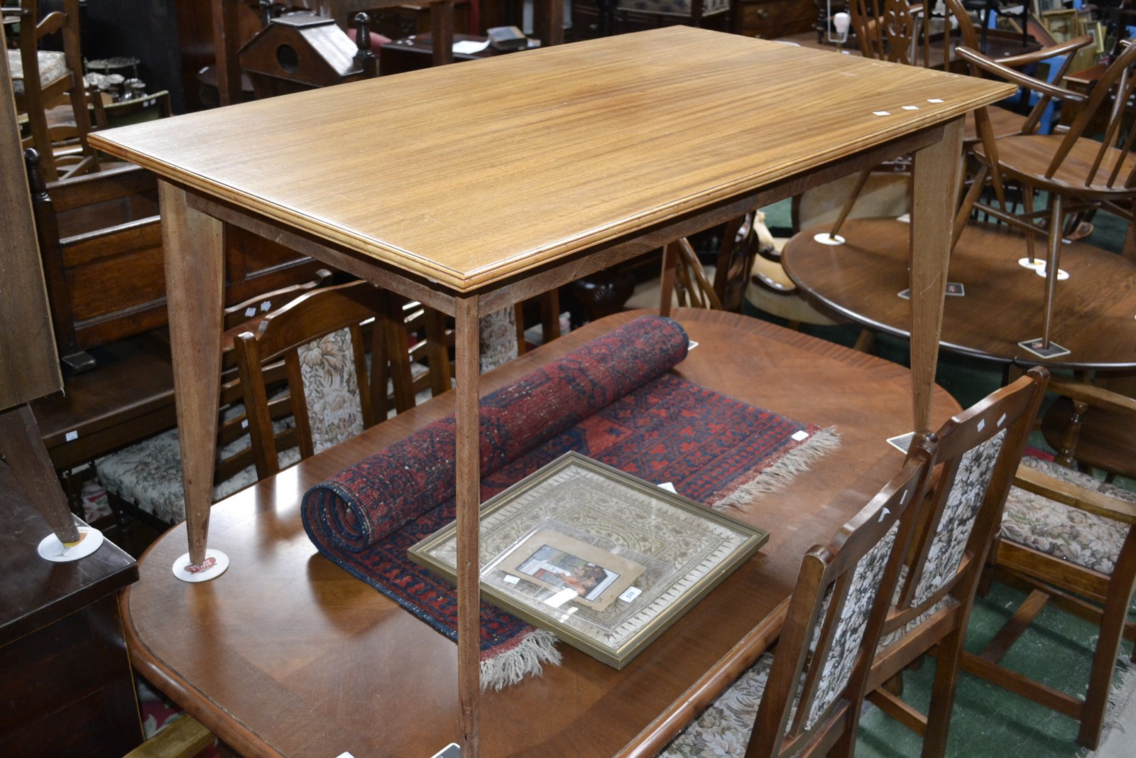 A Morris of Glasgow zebra wood dining table, moulded rectangular top, tapering supports, 74cm high,