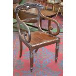 A Regency mahogany carver chair, foliate cresting top rail, carved horizontal splat,