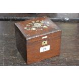 A 19th century French rosewood and mother of pearl marquetry rectangular tea caddy,