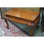 An oriental style coffee table, crossbanded rectangular top, moulded edge, shallow frieze,