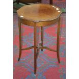 An Edwardian mahogany occasional table, quarter veneered circular shaped crossbanded top,