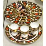 A Royal Crown Derby Imari 1128 dinner plate, a Royal Crown Derby 1128 Imari side plate,