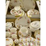 A Royal Crown Derby Posie tea service comprising teapot, cake plate, cups and saucers, tea plates,