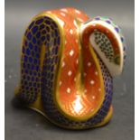 A Royal Crown Derby paperweight of a snake,