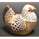 A Royal Crown Derby paperweight of a hen,