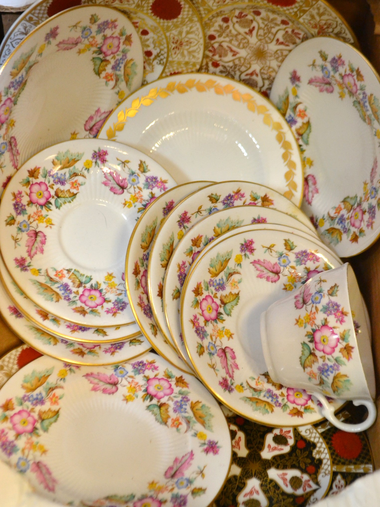 An Abbeydale Chrysanthemum pattern tea plate; others similar; Abbeydale floral printed teaware;