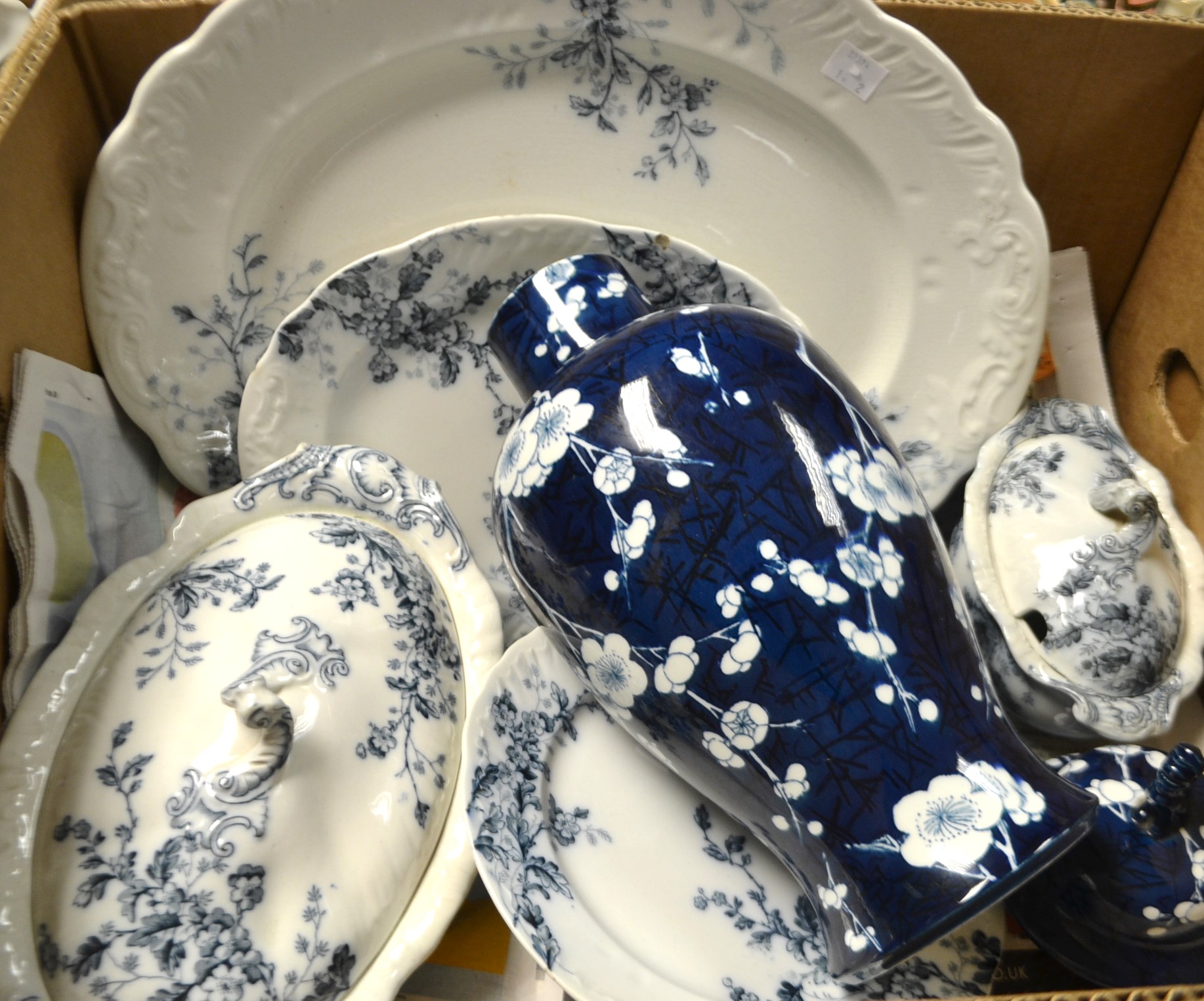 A Carltonware blue and white ginger jar and cover; a Booths blue and white part dinner service.