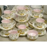 A Royal Albert Braemar pattern tea service comprising thirteen tea plates, cake plate,