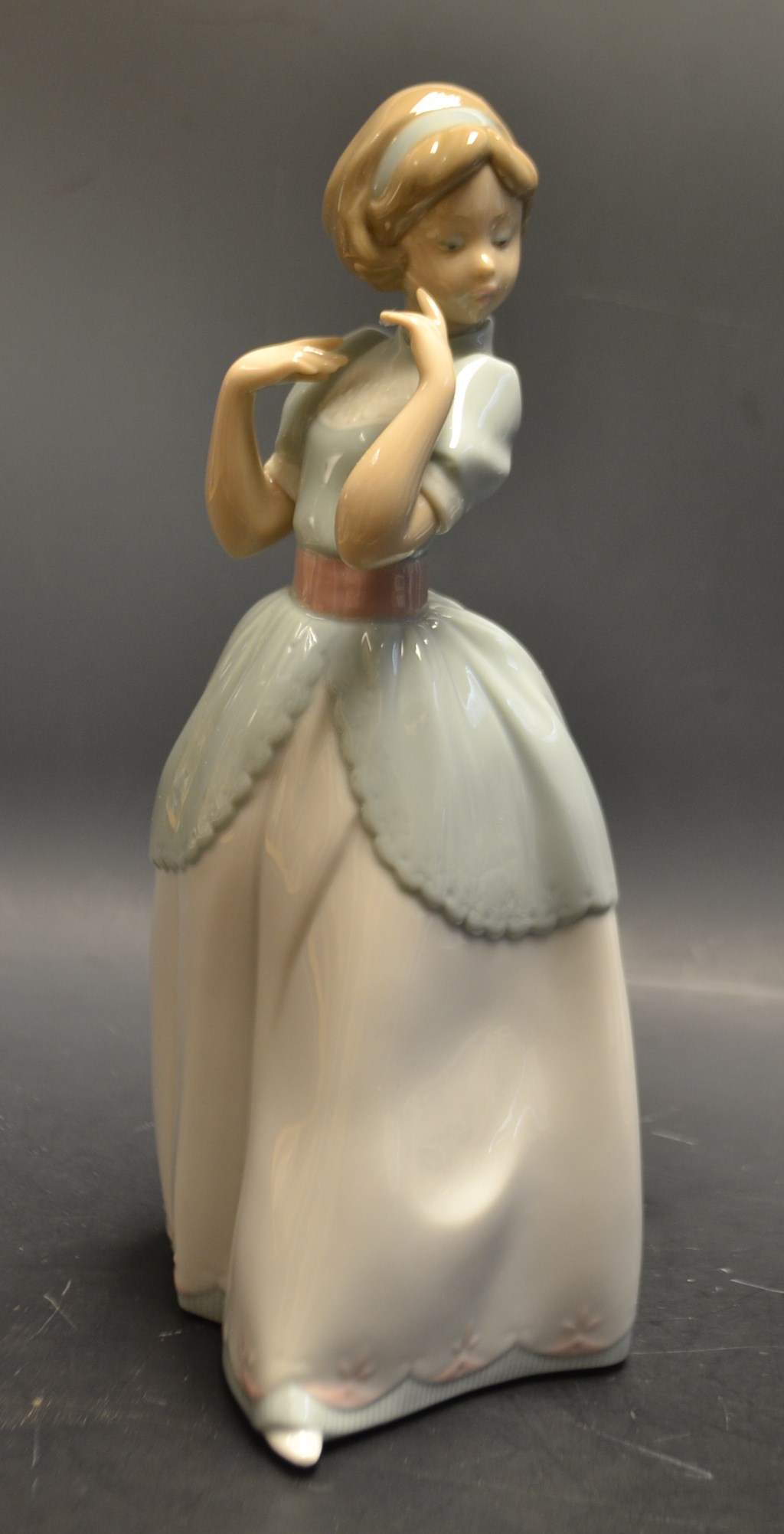 A Lladro figure a Proper Pose (06755), boxed with certificate.