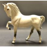 A Beswick model of a dappled grey horse,