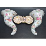 A Royal Worcester miniature toast rack decorated with butterflies and flowers, cream ground,