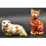 A Royal Crown Derby paperweight of a ginger cat,