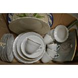 A contemporary porcelain dinner service; a modern cream ware serving plate; other modern ceramics;
