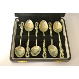 A set of six Chinese silver teaspoons, entwined serpent handles,
